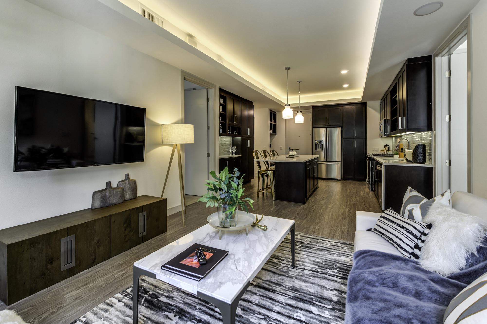 a living room with a couch and a table